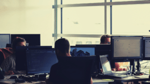 people using computers in an office